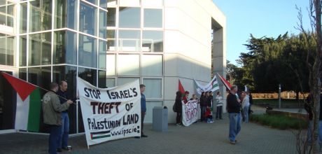 Click on image to see full-sized version Protesters assembled at front entrance to Clinton Institute
