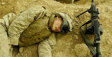 Click on image to see full-sized version US marines asleep at their base in Falluja, Iraq. Photograph: Nicolas Asfouri/AFP/Getty images