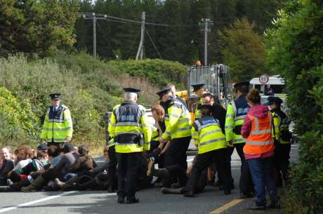 Click on image to see full-sized version Gardaí using pressure points forcing people to release themselves