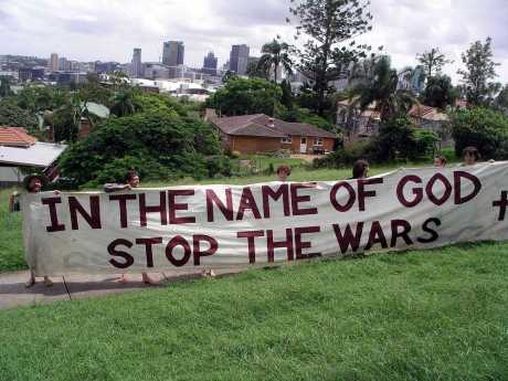 Photos from Anti-War Vigil in flooded Brisbane, Australia 