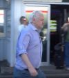 Julian Assange free walks to a plane for immediature departure from UK