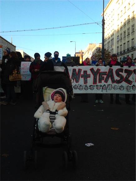 Click on image to see full-sized version Mia (my kid) on the frontline. "Let me at them fascists, let me at them......"